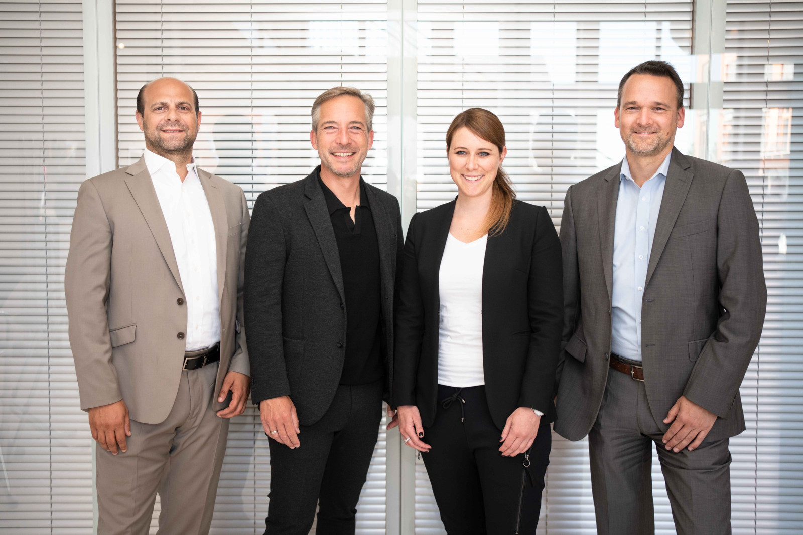 Das Management-Team der Eucon Group mit Osvaldo Celani (Geschäftsführer Automotive), Sven Krüger (CEO), Katharina Grasser (CFO) und Dr. Wolff Graulich (Geschäftsführer Insurance) blickt auf 25 Jahre Unternehmenshistorie (im Bild von links).